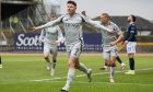 Kevin Nisbet celebrates scoring to make it 1-0 against Dundee. Image: SNS