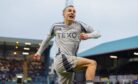 Aberdeen's Topi Keskinen jumps up and punches the air in delight to celebrate his goal in the 2-1 Premiership win at Dundee.