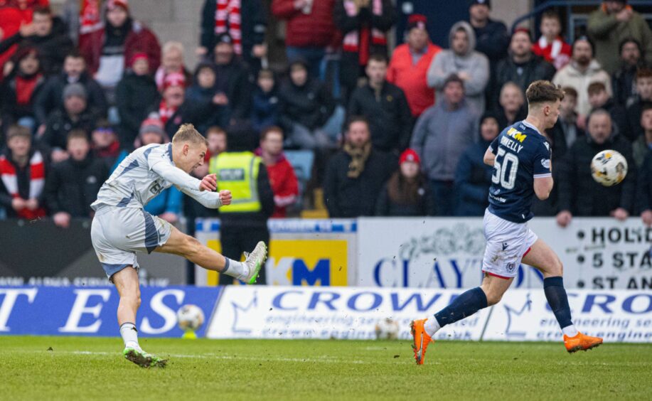 Topi Keskinen scores to make it 2-0 for Aberdeen against Dundee at Dens Park. Image: SNS