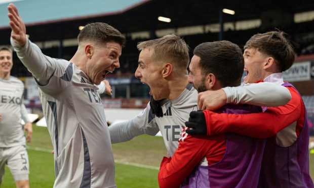 Aberdeen's Topi Keskinen celebrates scoring to make it 2-0 with Kevin Nisbet at Dundee. Image: SNS