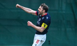 Ross County captain Connor Randall celebrates after scoring the third and final goal in his team's 3-0 win at Motherwell in the SPFL Premiership on February 15, 2025.