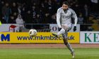 Aberdeen's Oday Dabbagh has a shot during the 2-1 Premiership win against Dundee at Dens Park. Image: SNS