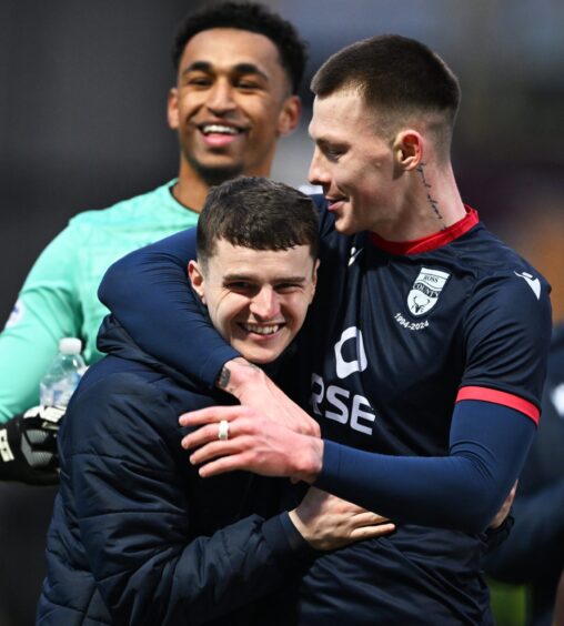 Ross County forward Ronan Hale, centre, with goalkeeper Jordan Amissah, back, and defender Kacper Lopata, right, celebrate their side's 3-0 SPFL Premiership win against Motherwell at Fir Park Stadium, Motherwell, on February 15, 2025. 