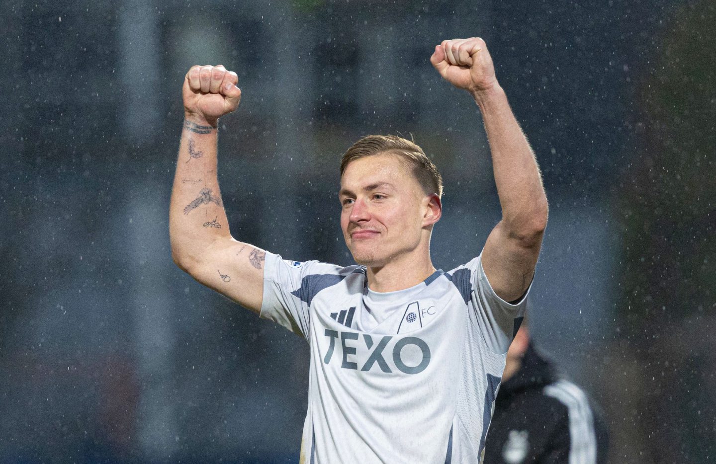 Aberdeen's Kristers Tobers celebrates his side's 2-1 win at Dundee. Image: SNS