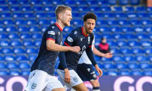 Kieran Phillips celebrates with Jonathan Tomkinson after scoring for Ross County against Dundee.