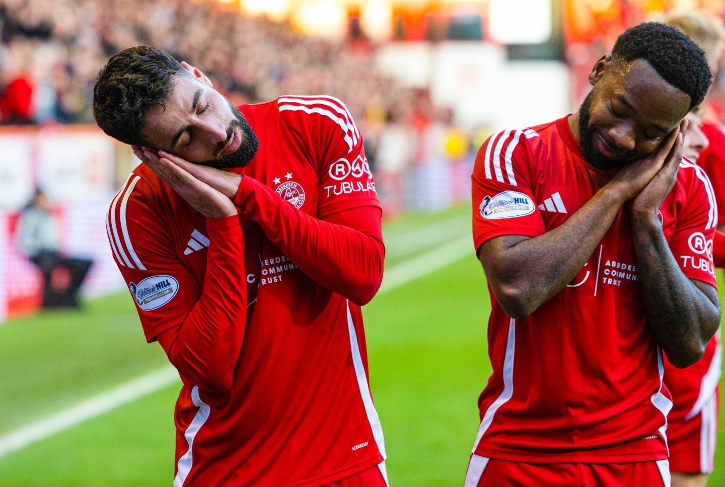 Aberdeen's Oday Dabbagh (L) celebrates scoring to make it 1-0 with teammate Shayden Morris in the 1-0 win against Kilmarnock at Pittodrie. Image: SNS 