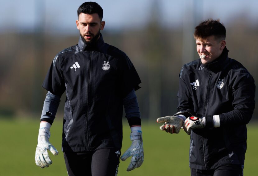 Dimitar Mitov (L) and Tom Ritchie during an Aberdeen training session at Cormack Park, on February 24, 2025. Image: SNS.