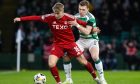 Aberdeen's Jeppe Okkels (L) and Celtic's Alistair Johnston in action at Parkhead. Image: SNS.