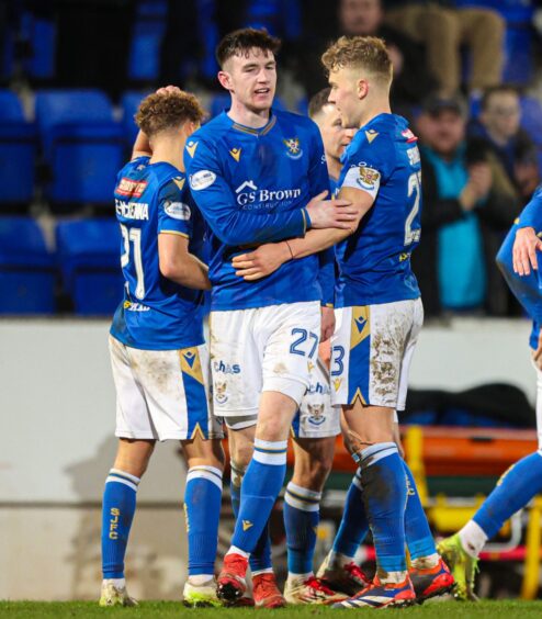 Makenzie Kirk leads St Johnstone's celebrations after scoring against Ross County.