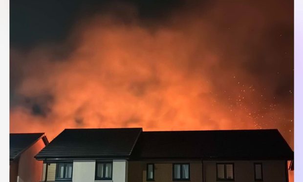 Fire behind houses in Aberdeen