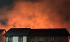 Fire behind houses in Aberdeen