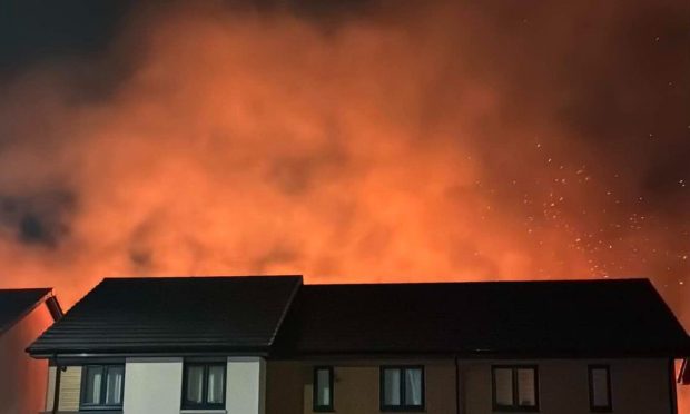 Fire behind houses in Aberdeen