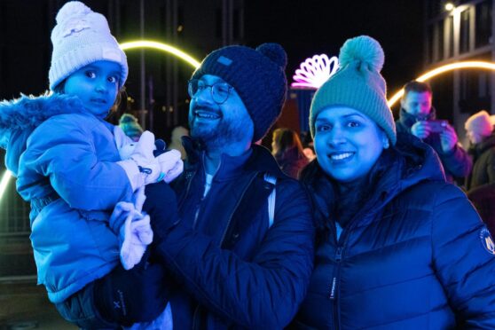 The Bhardwai family enjoying an evening at Spectra. Image: Ethan Williams