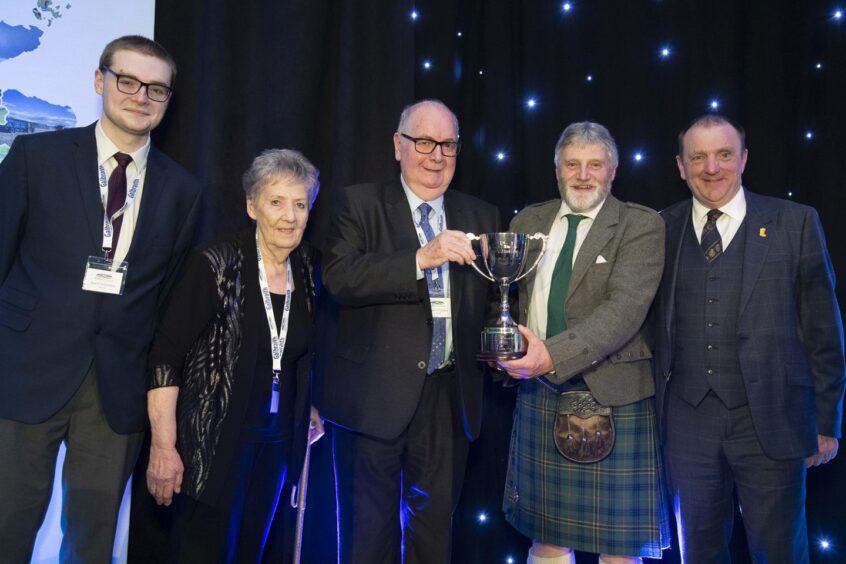 Agricultural journalist Eddie Gillanders receives the Ambassador Award from outgoing president Martin Kennedy at NFU Scotland's annual dinner in Glasgow.