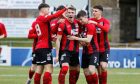 Kyle Girvan leads Elgin City players' celebrations after scoring against East Fife.