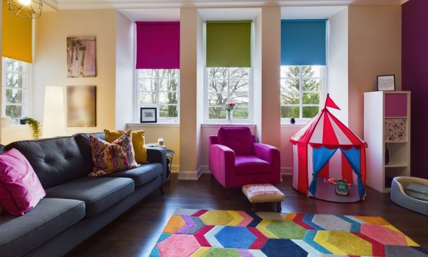 As this photo shows, Ryan and Megan have added pops of colour to their elegant townhouse