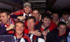 Inverness Caledonian Thistle players and manager Steve Paterson celebrate after their famous 3-1 Scottish Cup win over Celtic at Parkhead, Glasgow, on Tuesday, February 8, 2000, in the Scottish Cup.