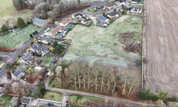 Aerial view of the development land for sale at Rothiemay.