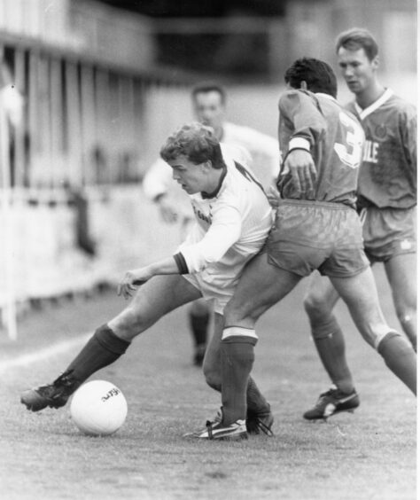 Billy Ferries in action for Ross County against Cove Rangers in 1991. 