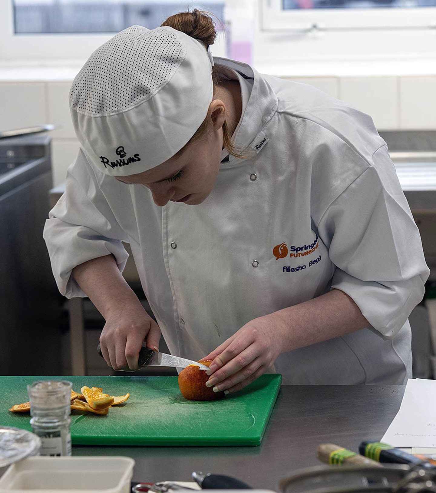 Aleisha Begg chopping food 