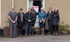 To go with story by Andrew Morton. Insch Hospital supporters have hailed new funding for a dementia support group that they hope will be held inside the community hopsital, which was mothballed almost five years ago.  Picture shows; From l-r, GP Paul Davies, Kerry Smith, Morris Tait, Alasdair MacCallum, Jane Reid, Jenny Robertson, Allison Grant. Insch War Memorial Hospital. Supplied by Friends of Insch Hospital Date; 03/02/2025