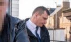 Tomasz Wlochowski leaves Peterhead Sheriff Court. Image: DC Thomson