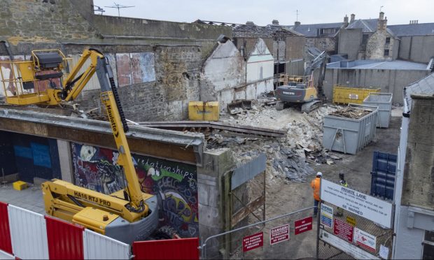 Demolition behind Junners buildings.