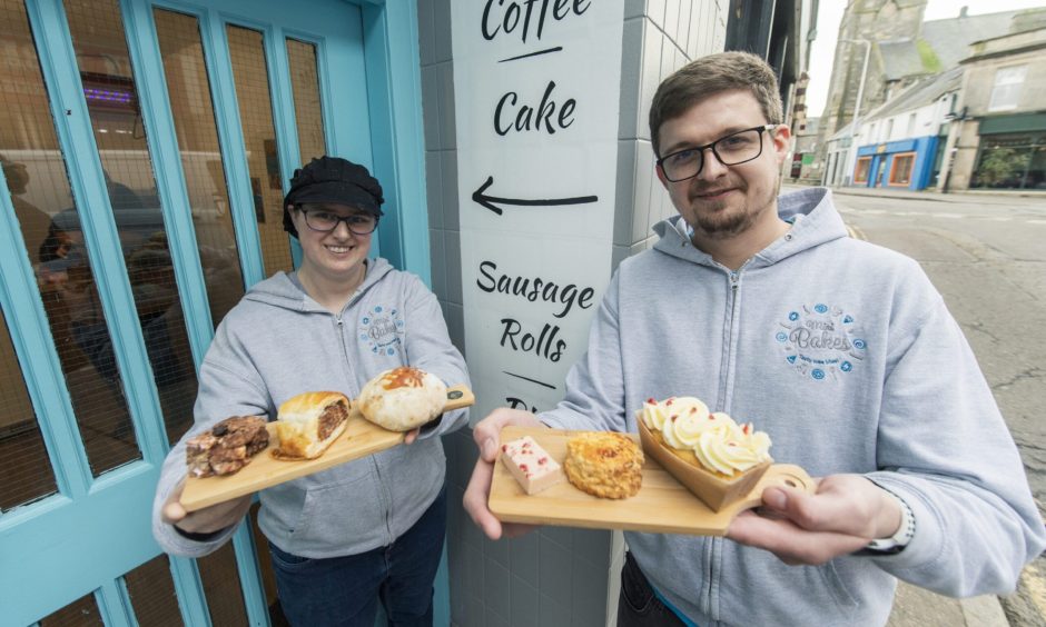 Ruby and Lewis Smart outside Mini Bakes. 