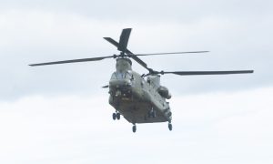 an airborne military helicopter