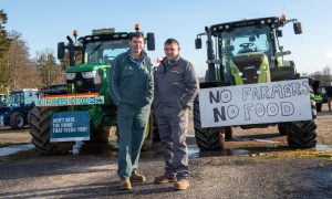 Farmers stand united in protest, with tractors and bold messages leading the charge through Aberdeen and beyond. Image: Kenny Elrick/DC Thomson