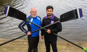 RGU principle Steve Olivier and sports president Abhishek Kumar on the River Dee. The duo will take on two faculty members from the University of Aberdeen in a special addition to this year's Aberdeen university boat race. Image: Kenny Elrick/DC Thomson