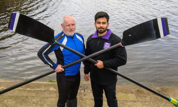 RGU principal Steve Olivier and sports president Abhishek Kumar on the River Dee. The duo will take on two faculty members from the University of Aberdeen in a special addition to this year's Aberdeen university boat race. Image: Kenny Elrick/DC Thomson