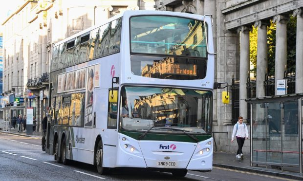 Purple double decker bus in Aberdeen.