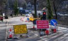 Temporary traffic lights on A96 in Keith.