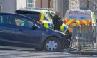 Car crashed into railing on Queen's Road