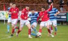 Banks o' Dee's Kane Winton, centre challenging Brechin's Spencer Moreland, right, and Lewis Martin, second from left (in red). Photos by Kath Flannery/DC Thomson