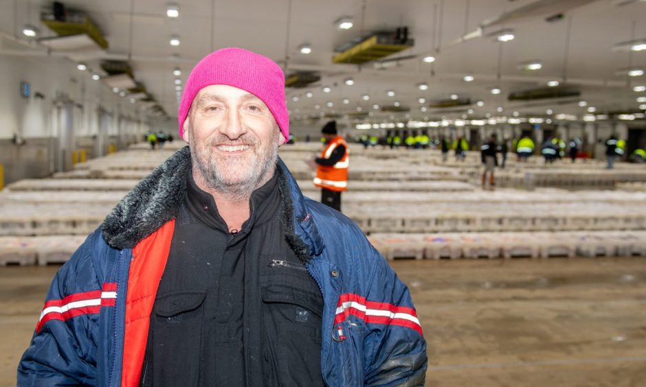 Andrew has been coming to Peterhead Fish Market since he was years old. Image: Kami Thomson/DC Thomson