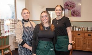 Nijole Skersiene, the new owner of Peterhead cafe Simpsons Tea Room, alongside waitresses Sophie Cruickshank and Shannon Urquhart. Image: Kami Thomson/DC Thomson