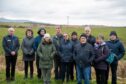 Daviot residents with the site of the proposed crematorium in the distance. Image: Kami Thomson/DC Thomson