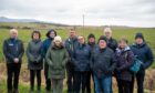 Daviot residents with the site of the proposed crematorium in the distance. Image: Kami Thomson/DC Thomson