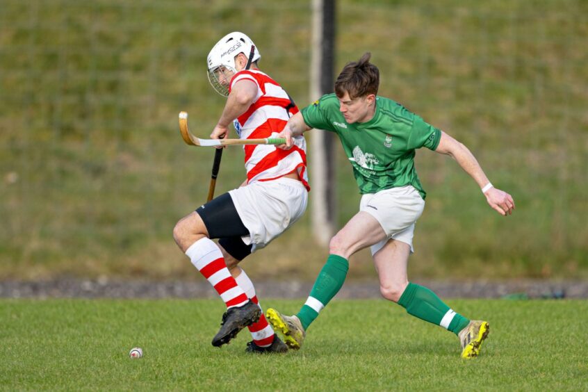 Lochaber's Kevin Ferguson (left) with Ryan Mackay (Beauly). Image: Neil G Paterson.