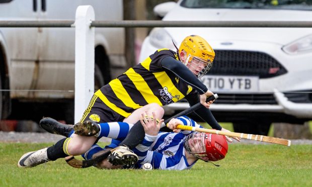 Col Glen's Auryn Kerr gets on top of Daniel Sloss (Newtonmore) in a pre-season game played at The Eilan, Newtonmore. Image: Neil Paterson.