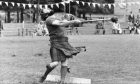 Alan Sim of Fettercairn has a mighty effort at throwing the light hammer at Oldmeldrum Sports."