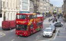 An open-topped City sightseeing bus in Inverness.