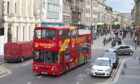 An open-topped City sightseeing bus in Inverness.