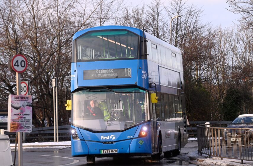 Blue double decker First Bus.