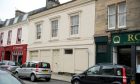 Elgin High Street building exterior.