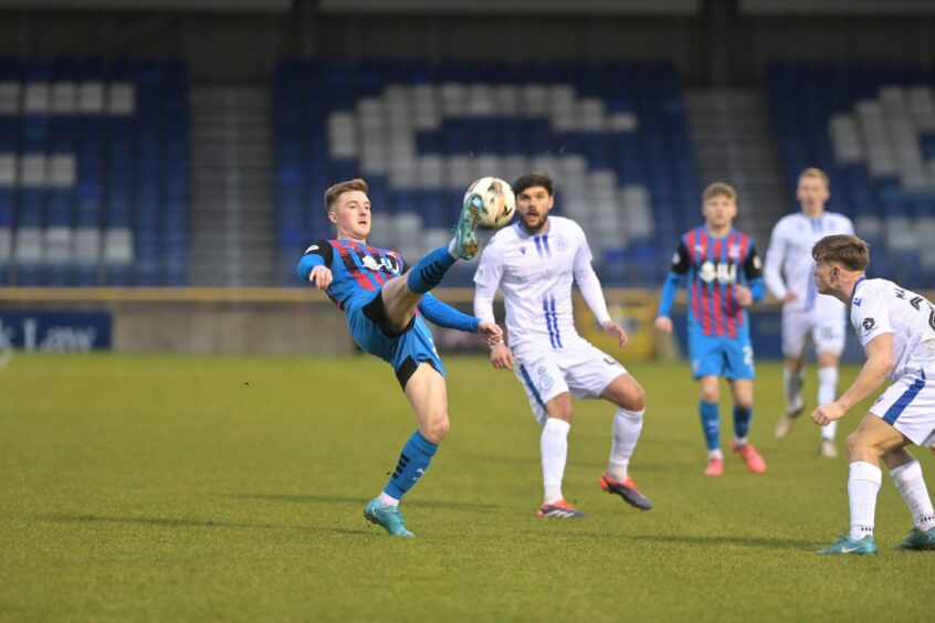 Inverness Caledonian Thistle midfielder Paul Allan in action with the ball at his right foot during his team's 1-0 SPFL League One win against Queen of the South at the Caledonian Stadium, Inverness, on Saturday, February 1, 2025.