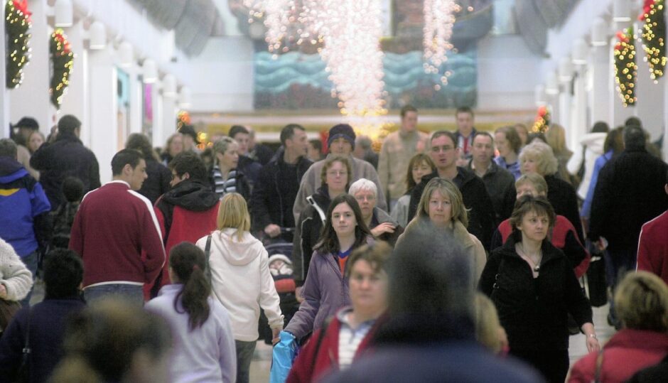 Crowds of shoppers yesterday in the Eastgate Shopping Centre in Inverness back in 2003. Image: Sandy McCook/DC Thomson