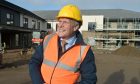 Ron Taylor, managing director of Parklands Care Homes at the under construction care home in Milton of Leys. Image: Sandy McCook/DC Thomson